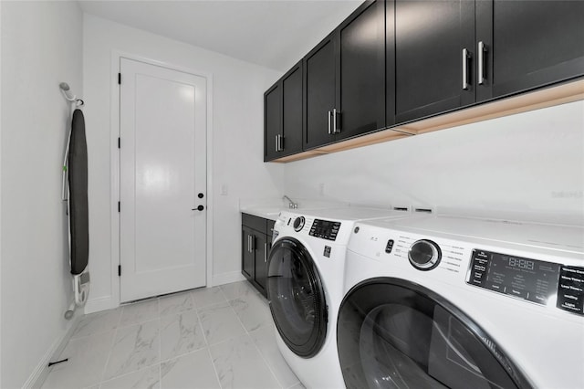 17333 Savory Mist Cir, Bradenton, FL 34211 - laundry area featuring cabinet space, light marble finish flooring, washing machine and dryer, and baseboards