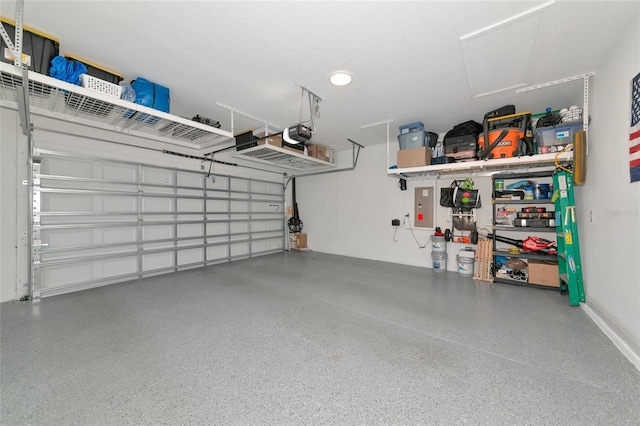 17333 Savory Mist Cir, Bradenton, FL 34211 - garage featuring a garage door opener
