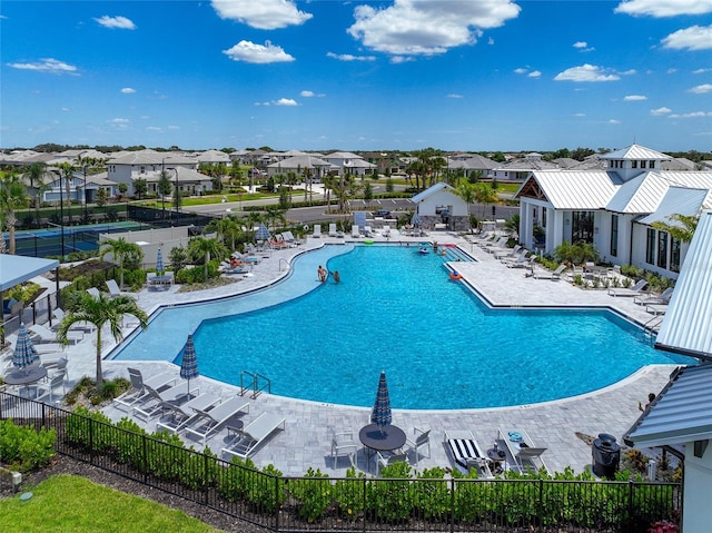 17333 Savory Mist Cir, Bradenton, FL 34211 - community pool featuring a patio and a residential view