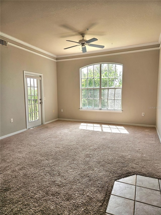 5146 Northridge Rd Unit 310, Sarasota, FL 34238 - spare room featuring crown molding, ceiling fan, carpet flooring, baseboards, and a textured ceiling
