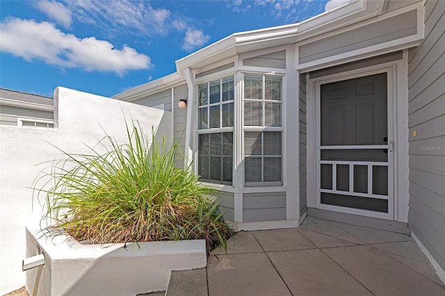 1316 Perico Point Cir, Bradenton, FL 34209 - view of exterior entry with a patio area