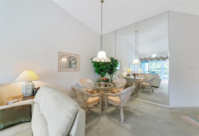 1316 Perico Point Cir, Bradenton, FL 34209 - carpeted dining area with high vaulted ceiling and ceiling fan