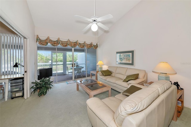 1316 Perico Point Cir, Bradenton, FL 34209 - living area featuring vaulted ceiling, carpet flooring, and a ceiling fan