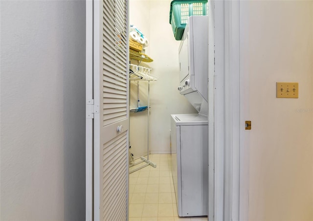 1316 Perico Point Cir, Bradenton, FL 34209 - washroom with stacked washer / dryer and light tile patterned flooring