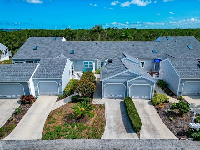 1316 Perico Point Cir, Bradenton, FL 34209 - view of property featuring roof with shingles and concrete driveway