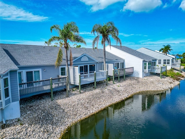 1316 Perico Point Cir, Bradenton, FL 34209 - rear view of property featuring a deck with water view and roof with shingles