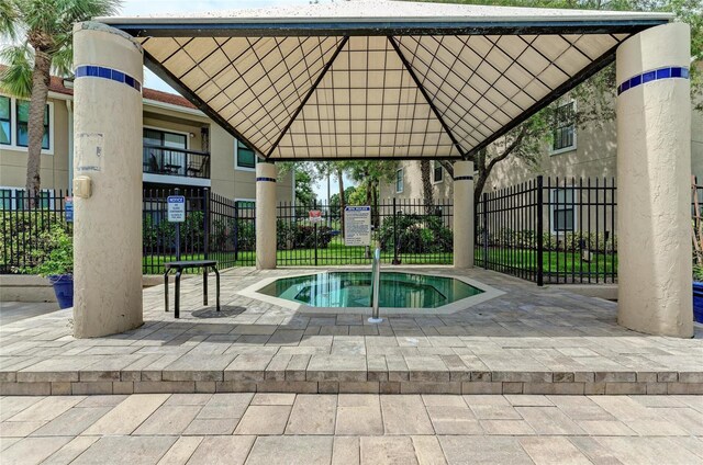 4057 Crockers Lake Blvd Unit 15, Sarasota, FL 34238 - view of swimming pool with a gazebo