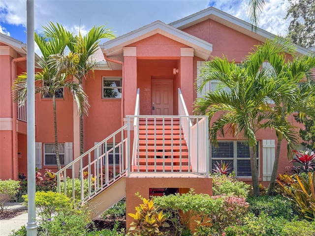 5500 Longwood Run Blvd Unit 203, Sarasota, FL 34243 - view of front of property featuring stucco siding