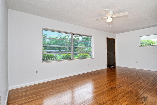 1354 22nd St, Sarasota, FL 34234 - spare room with hardwood / wood-style floors, a ceiling fan, and a textured ceiling
