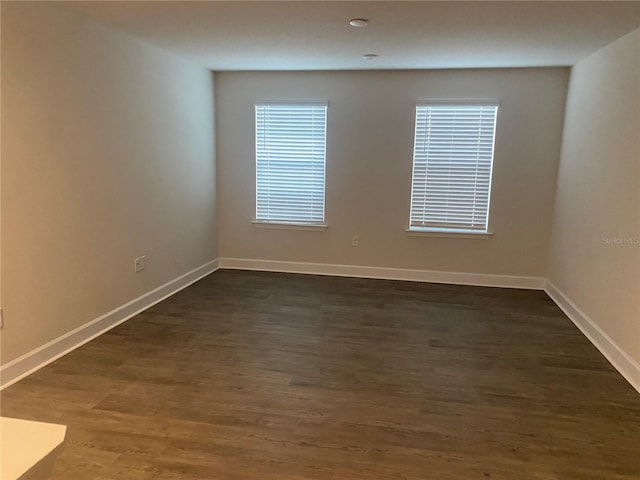1710 Summer Rose Dr, Mount Dora, FL 32757 - spare room featuring baseboards and dark wood-style flooring