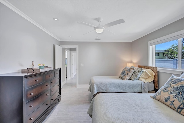 139 Vista Hermosa Cir, Sarasota, FL 34242 - bedroom with light wood finished floors, recessed lighting, crown molding, and ceiling fan