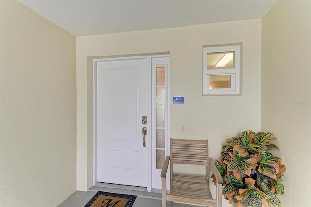 7820 34th Ave W Unit 102, Bradenton, FL 34209 - doorway to property featuring stucco siding
