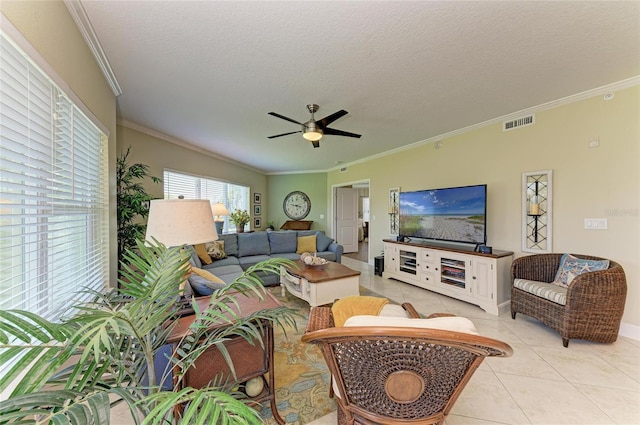 7820 34th Ave W Unit 102, Bradenton, FL 34209 - living room featuring crown molding, light tile patterned floors, ceiling fan, and a textured ceiling
