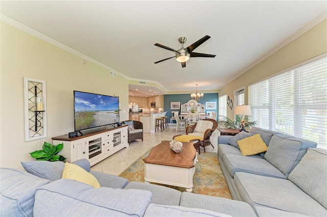 7820 34th Ave W Unit 102, Bradenton, FL 34209 - living area featuring crown molding, a chandelier, ceiling fan, and light tile patterned floors