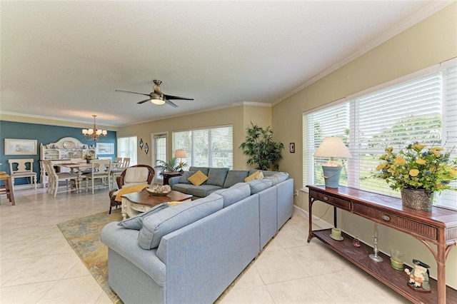 7820 34th Ave W Unit 102, Bradenton, FL 34209 - living area with ornamental molding, ceiling fan, light tile patterned flooring, and a chandelier