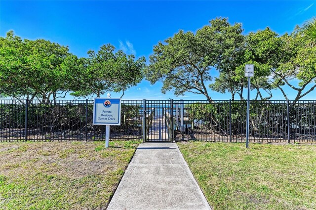 7820 34th Ave W Unit 102, Bradenton, FL 34209 - view of property's community featuring a gate