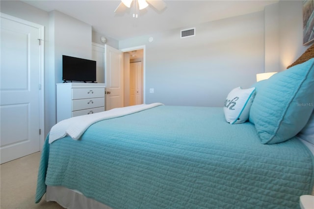 5750 Midnight Pass Rd Unit 203, Sarasota, FL 34242 - carpeted bedroom with ceiling fan