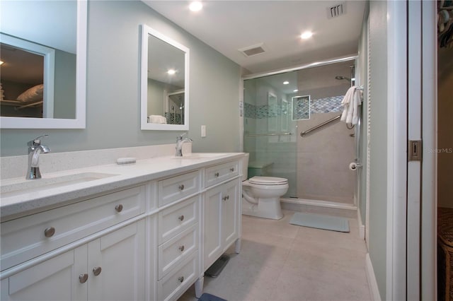 5750 Midnight Pass Rd Unit 203, Sarasota, FL 34242 - bathroom with double vanity, a shower stall, tile patterned flooring, and recessed lighting