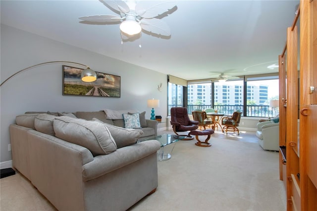 5750 Midnight Pass Rd Unit 203, Sarasota, FL 34242 - living room with ceiling fan and light colored carpet