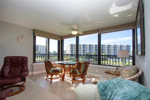 5750 Midnight Pass Rd Unit 203, Sarasota, FL 34242 - sunroom / solarium featuring tile patterned flooring and a view of city