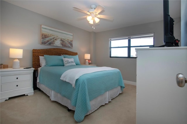 5750 Midnight Pass Rd Unit 203, Sarasota, FL 34242 - bedroom featuring light carpet and ceiling fan