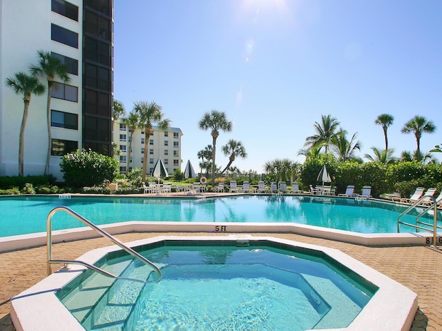 5880 Midnight Pass Rd Unit 202, Sarasota, FL 34242 - community pool featuring a community hot tub