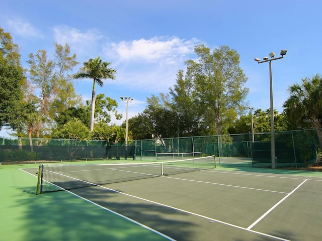 5880 Midnight Pass Rd Unit 202, Sarasota, FL 34242 - view of tennis court with community basketball court