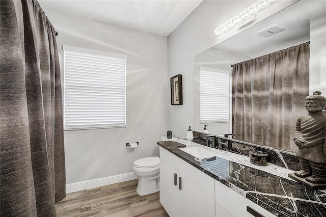 2912 51st St E, Bradenton, FL 34208 - bathroom featuring vanity and wood finished floors