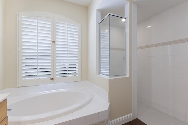 4998 Cedar Oak Way, Sarasota, FL 34233 - full bath with a bath, walk in shower, and vanity