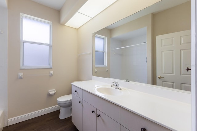4998 Cedar Oak Way, Sarasota, FL 34233 - full bath with vanity and wood finished floors