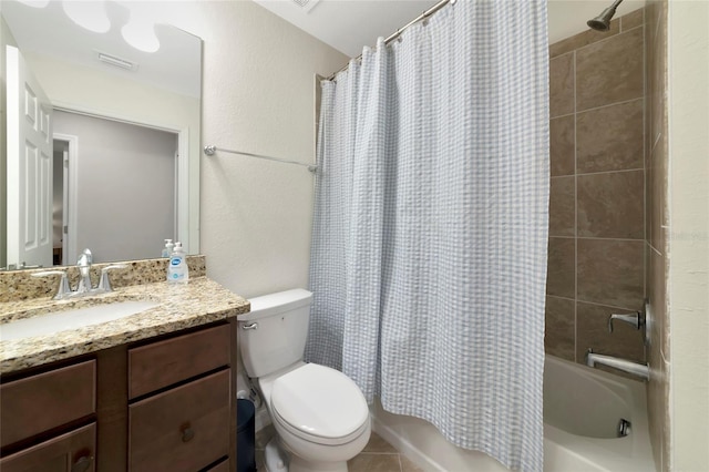 5604 Palmer Cir Unit 103, Bradenton, FL 34211 - bathroom featuring vanity, shower / tub combo with curtain, and tile patterned floors