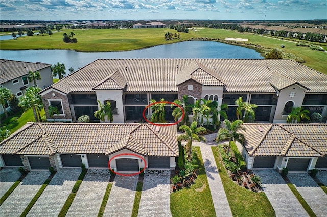 5604 Palmer Cir Unit 103, Bradenton, FL 34211 - aerial perspective of suburban area featuring a large body of water and a golf course