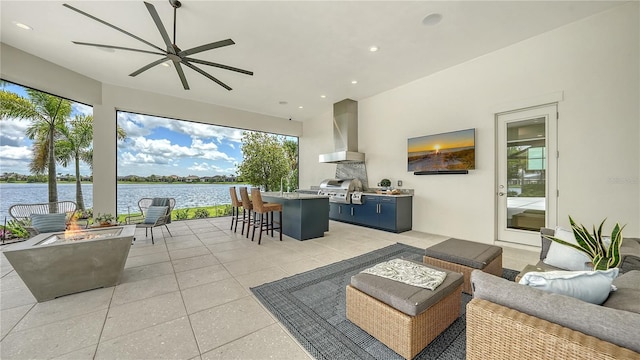 14665 Como Cir, Lakewood Ranch, FL 34202 - view of patio / terrace featuring an outdoor kitchen, an outdoor living space with a fire pit, and ceiling fan