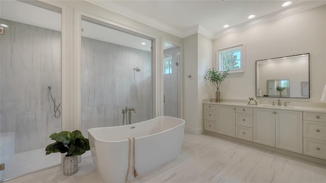 14665 Como Cir, Lakewood Ranch, FL 34202 - full bathroom featuring a freestanding tub, a walk in shower, vanity, ornamental molding, and recessed lighting