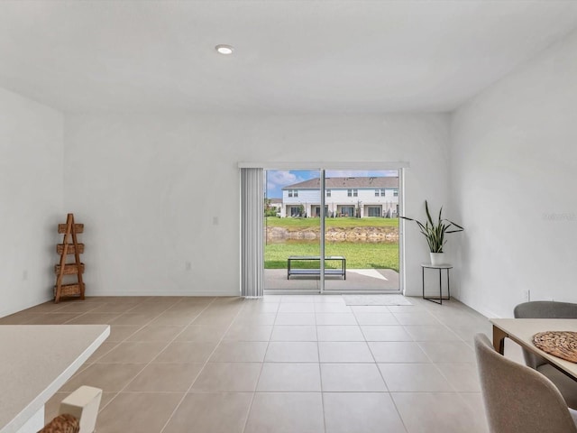 8733 Winter Breeze Way, Sarasota, FL 34241 - living room featuring light tile patterned floors
