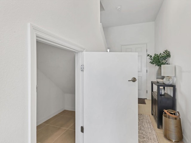 8733 Winter Breeze Way, Sarasota, FL 34241 - hall with light tile patterned floors