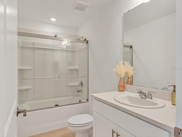 8733 Winter Breeze Way, Sarasota, FL 34241 - full bath with vanity, toilet, and shower / bath combination with glass door