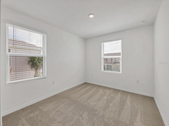 8733 Winter Breeze Way, Sarasota, FL 34241 - spare room with carpet flooring and baseboards