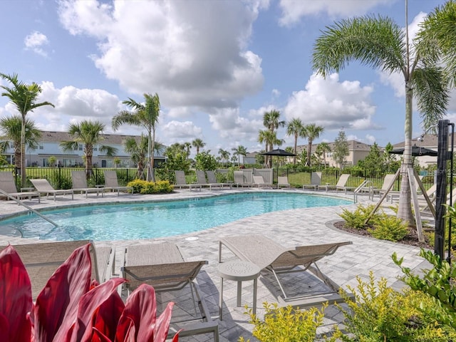 8733 Winter Breeze Way, Sarasota, FL 34241 - community pool with a patio