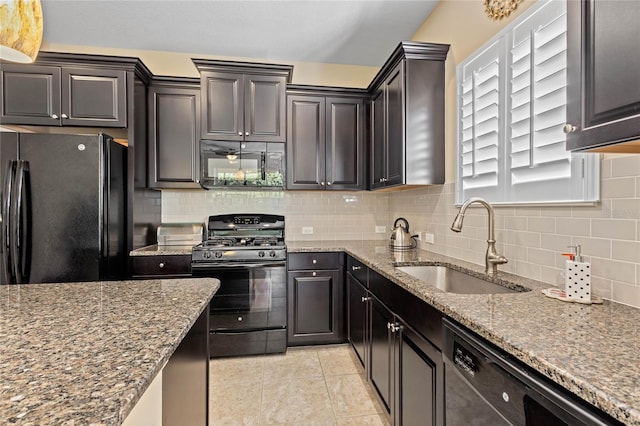 2070 Crystal Lake Trl, Bradenton, FL 34211 - kitchen featuring black appliances, light stone counters, tasteful backsplash, and light tile patterned floors