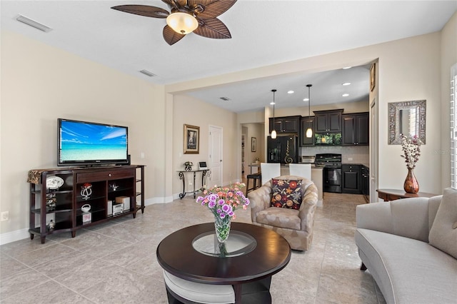 2070 Crystal Lake Trl, Bradenton, FL 34211 - living area featuring a ceiling fan, light tile patterned floors, and recessed lighting