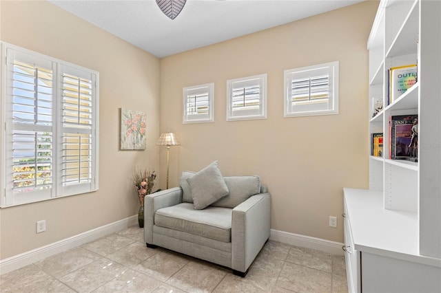 2070 Crystal Lake Trl, Bradenton, FL 34211 - living area with healthy amount of natural light and light tile patterned floors