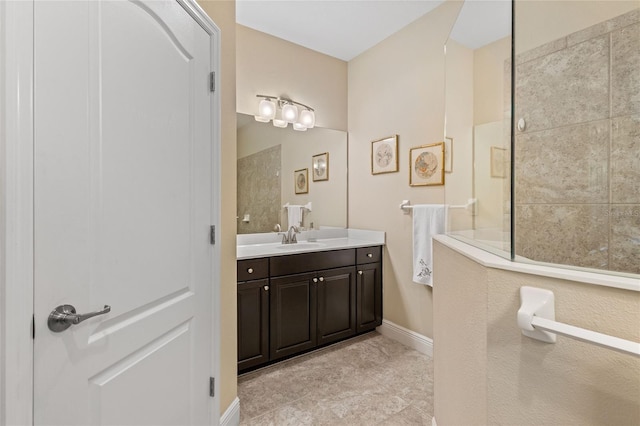 2070 Crystal Lake Trl, Bradenton, FL 34211 - bathroom with vanity, a walk in shower, and tile patterned flooring