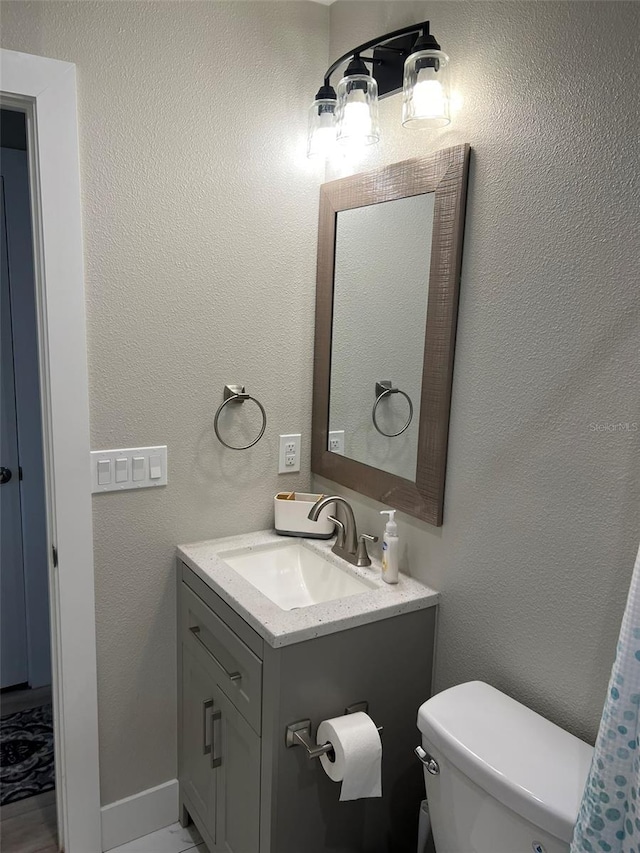 1840 3rd Ave E, Bradenton, FL 34208 - bathroom featuring vanity and toilet