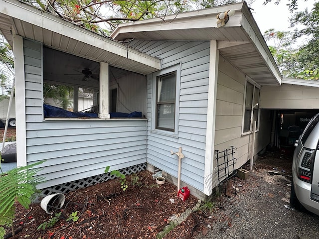 2230 50th Ave N, Saint Petersburg, FL 33714 - view of home's exterior with ceiling fan and a carport