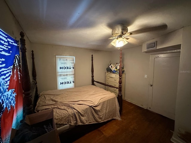 2230 50th Ave N, Saint Petersburg, FL 33714 - bedroom with dark wood-style floors and a ceiling fan