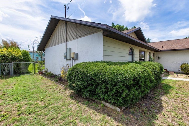 5213 20th Street Ct E, Bradenton, FL 34203 - view of home's exterior with a gate and stucco siding
