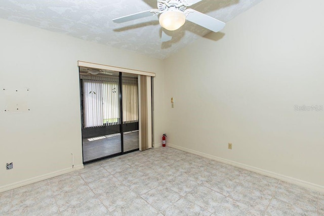 5213 20th Street Ct E, Bradenton, FL 34203 - spare room with baseboards and a ceiling fan