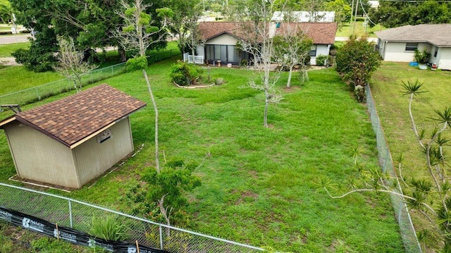 5213 20th Street Ct E, Bradenton, FL 34203 - view of yard featuring a storage unit