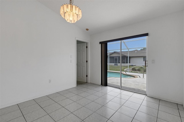 1026 Graham Rd, Venice, FL 34293 - unfurnished room featuring a chandelier and light tile patterned flooring